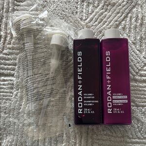 Rodan + Fields Volume Shampoo and Conditioner in Purple and White